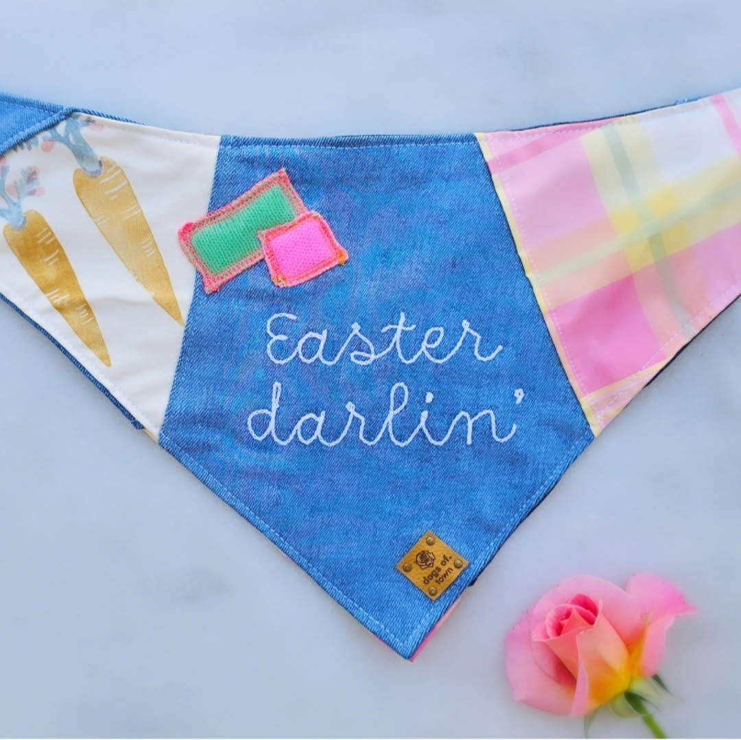 Colorful Easter-themed dog bandana with 'Easter darlin'' stitched on denim.