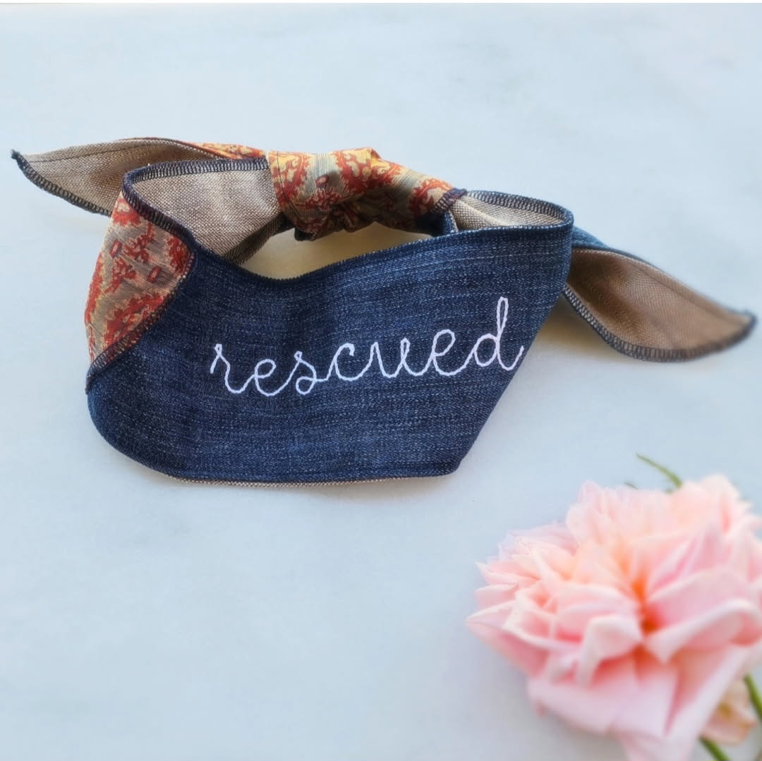 Handmade Japanese silk and denim dog scarf with 'rescued' embroidery for rescue dogs.